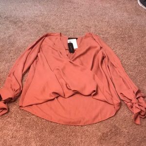 Rust colored blouse